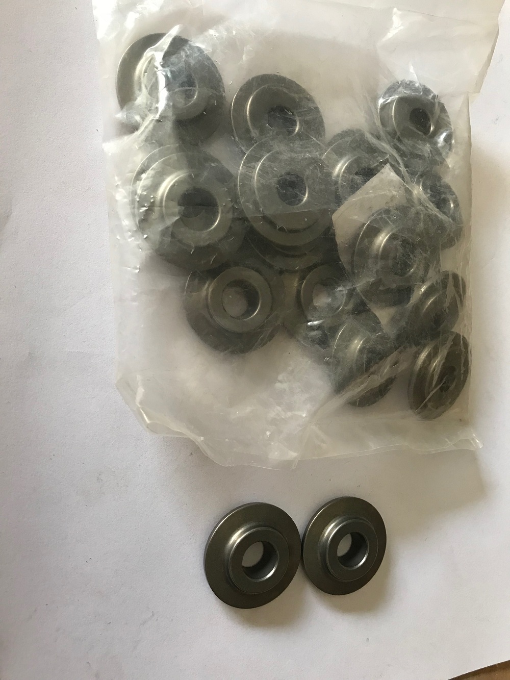 Valve spring retain